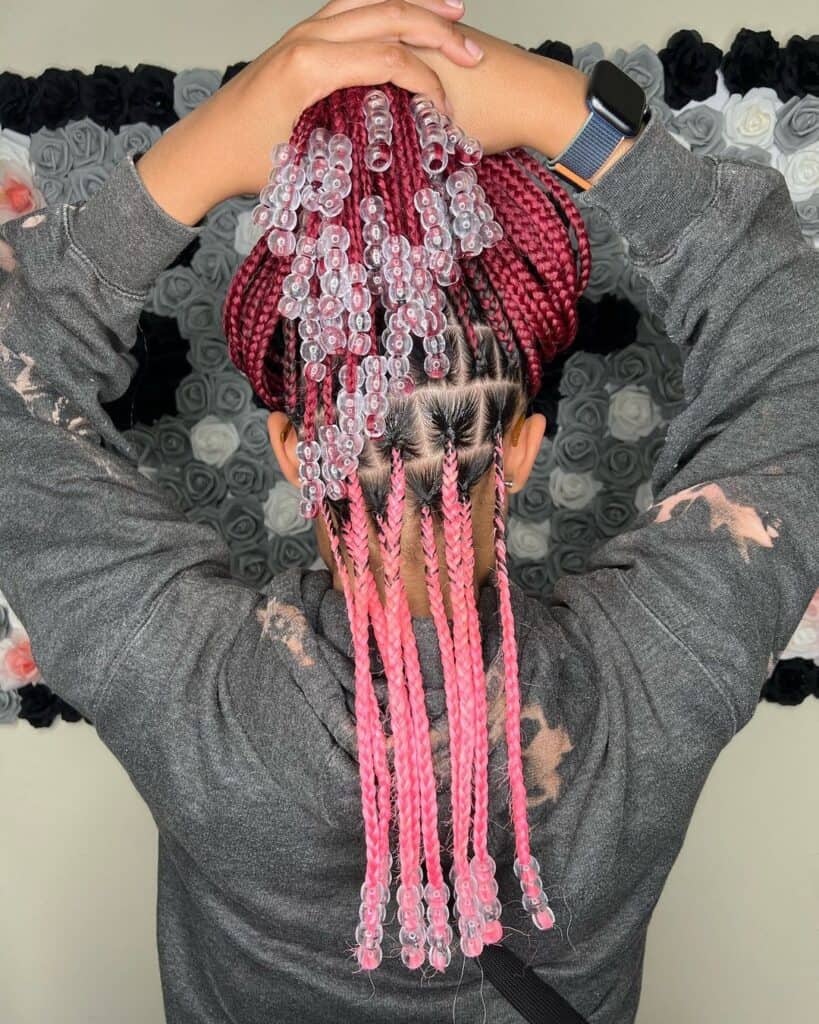 Burgundy and pink peekaboo braids with beads